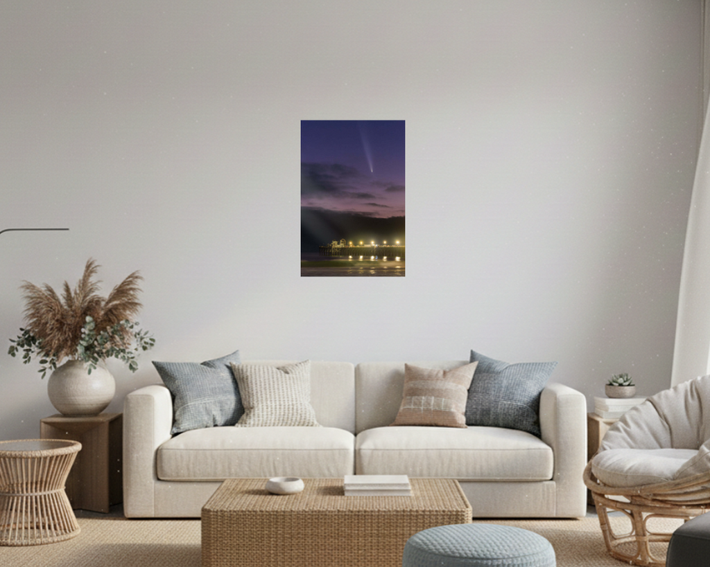 Modern living room with a white sofa, decorative pillows, and a wall art piece.
